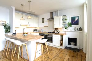 Open-plan kitchen with breakfast table- click for photo gallery